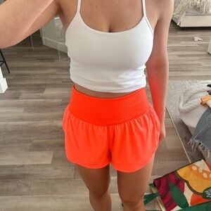 Free People neon orange shorts!